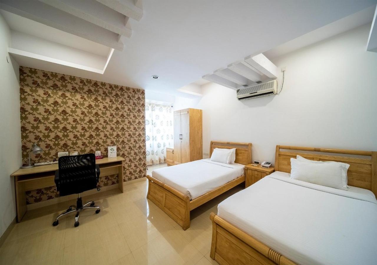 Capital O 46966 Apollo 27 Hotel Бангалор Екстериор снимка