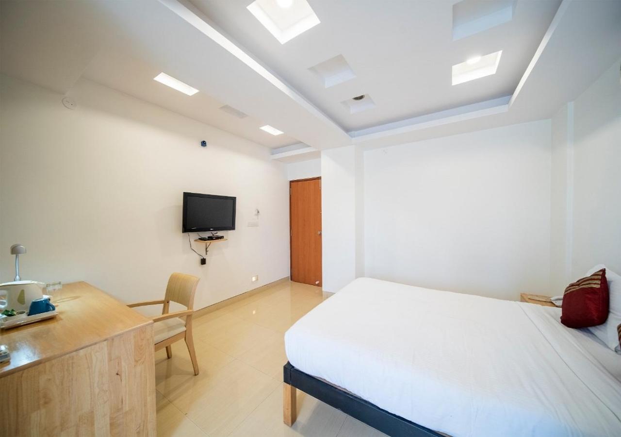 Capital O 46966 Apollo 27 Hotel Бангалор Екстериор снимка