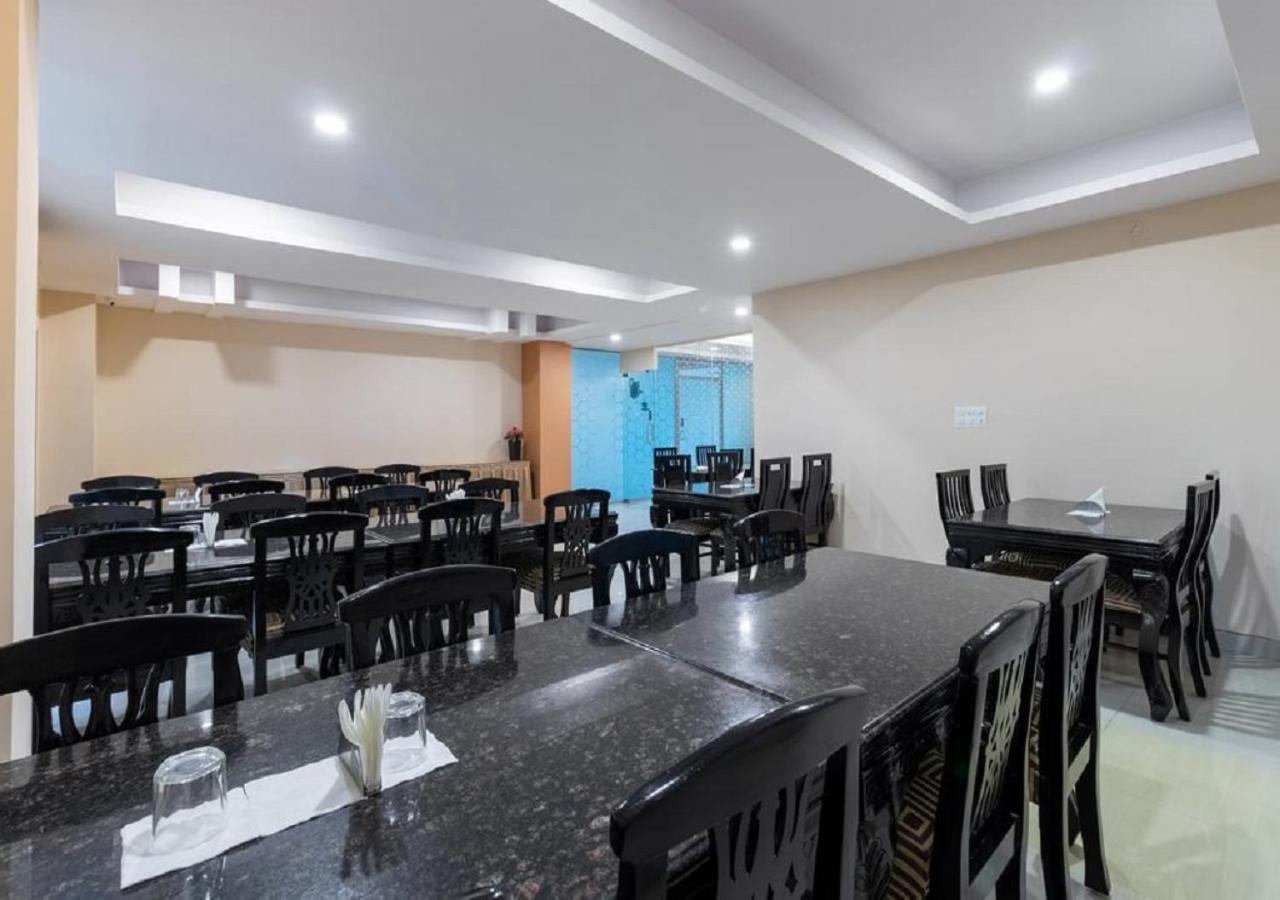 Capital O 46966 Apollo 27 Hotel Бангалор Екстериор снимка