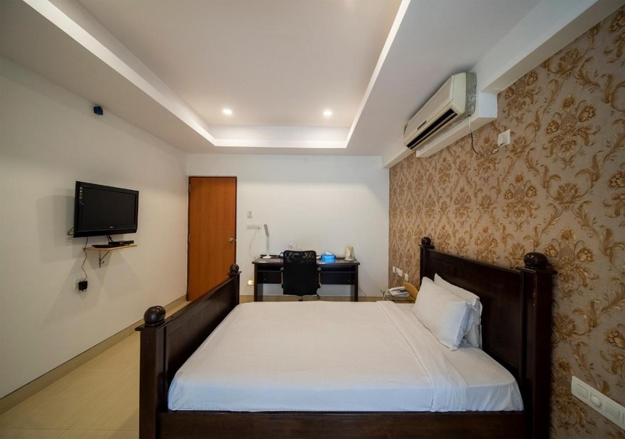 Capital O 46966 Apollo 27 Hotel Бангалор Екстериор снимка